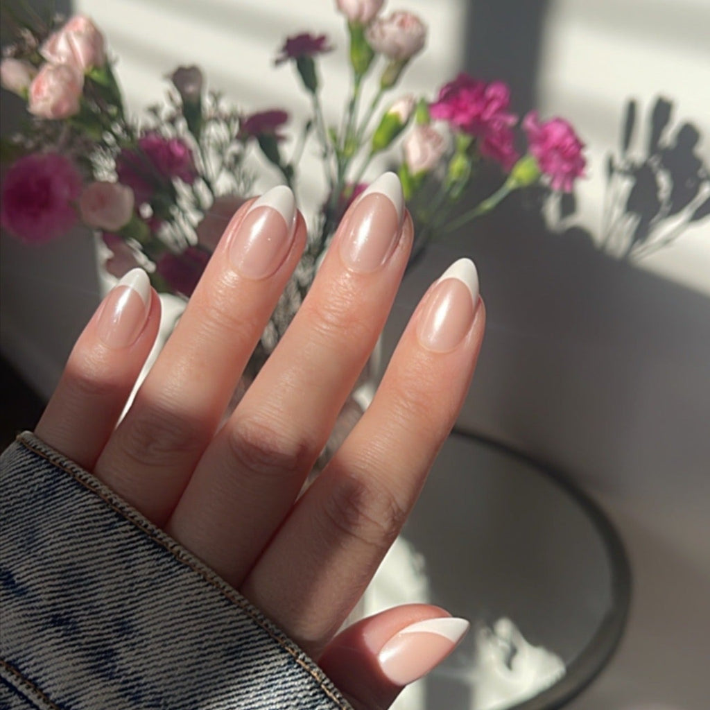 Girl wearing Instant Mani Co. Sorbet chrome glazed french press on nails 