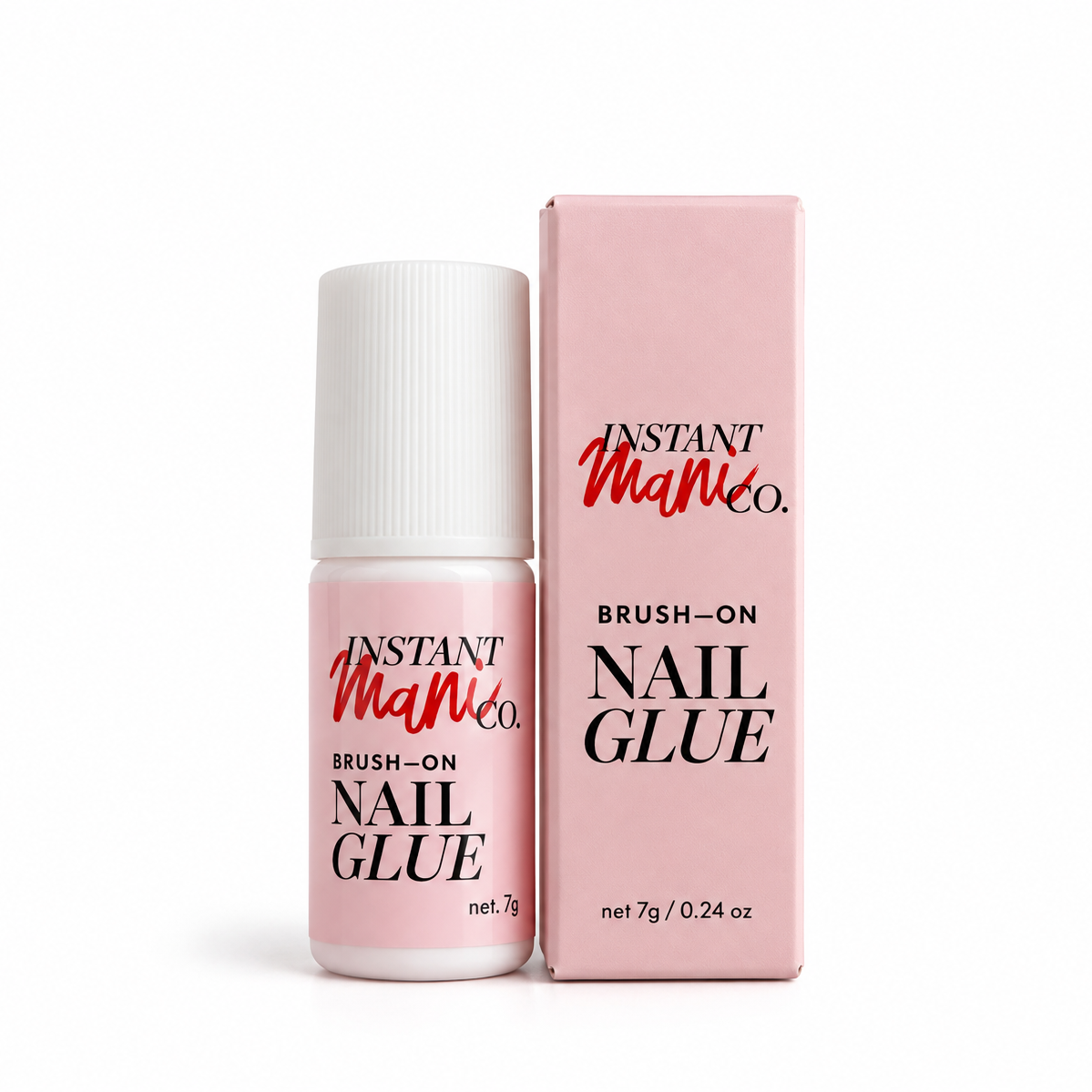 Instant Mani Co. Brush-On Nail Glue bottle next to its pink packaging box, on a clean white background.