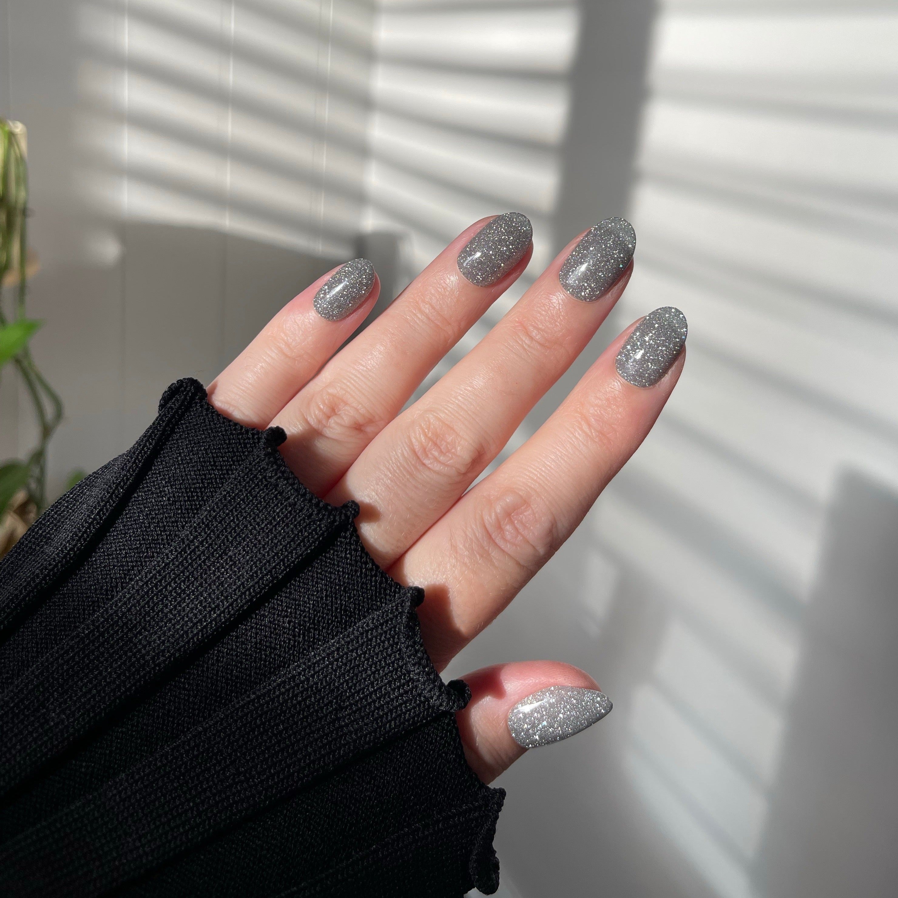 Girl wearing Lover, Instant Mani Co sparkly Press on nails