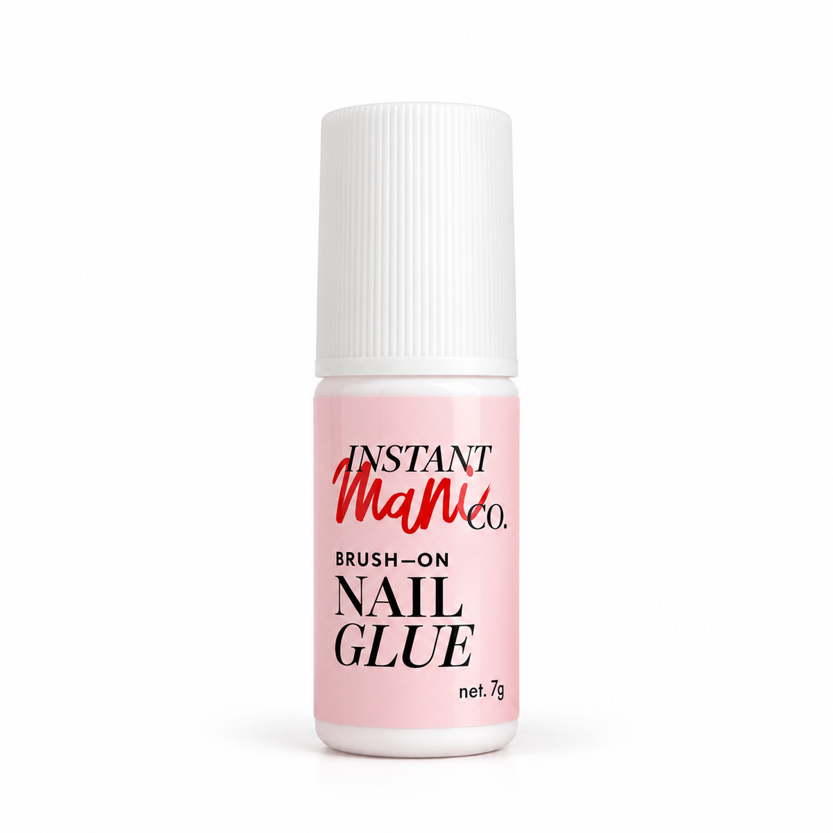 A bottle of Instant Manicure Co. Brush-On Nail Glue with a light pink label and a white cap, shown on a clean white background.