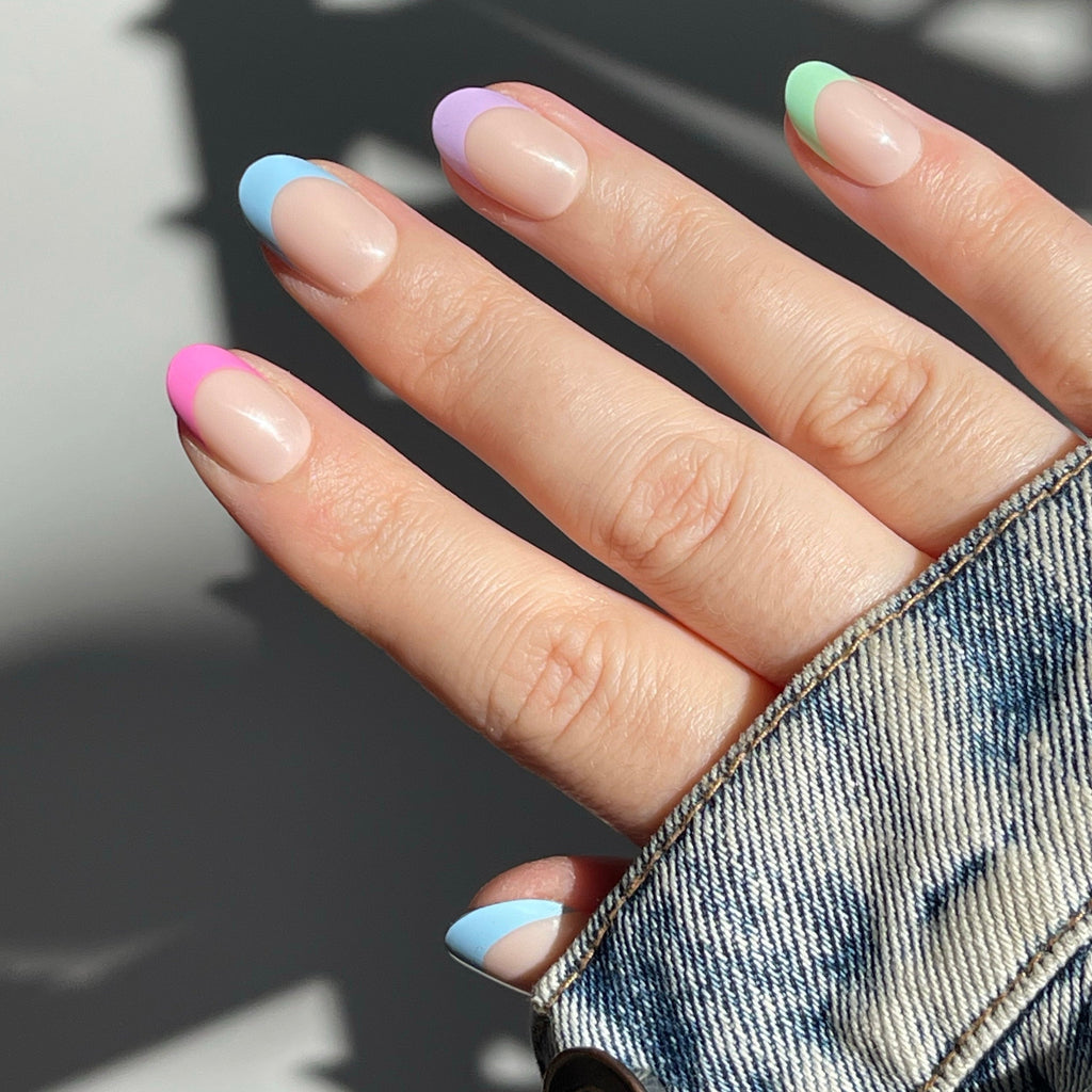 Girl wearing denim jacket and Instant Mani Co. confetti press on nails