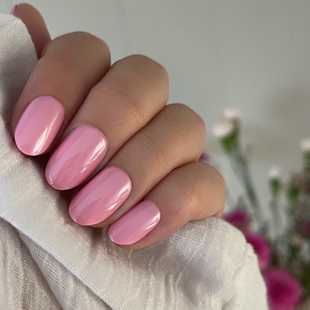 Girl wearing Instant Mani Co. Euphoria pink glazed chrome press on nails 