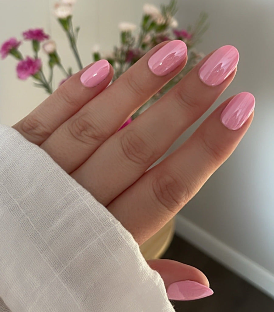 Girl wearing Instant Mani Co. Euphoria pink glazed chrome press on nails 