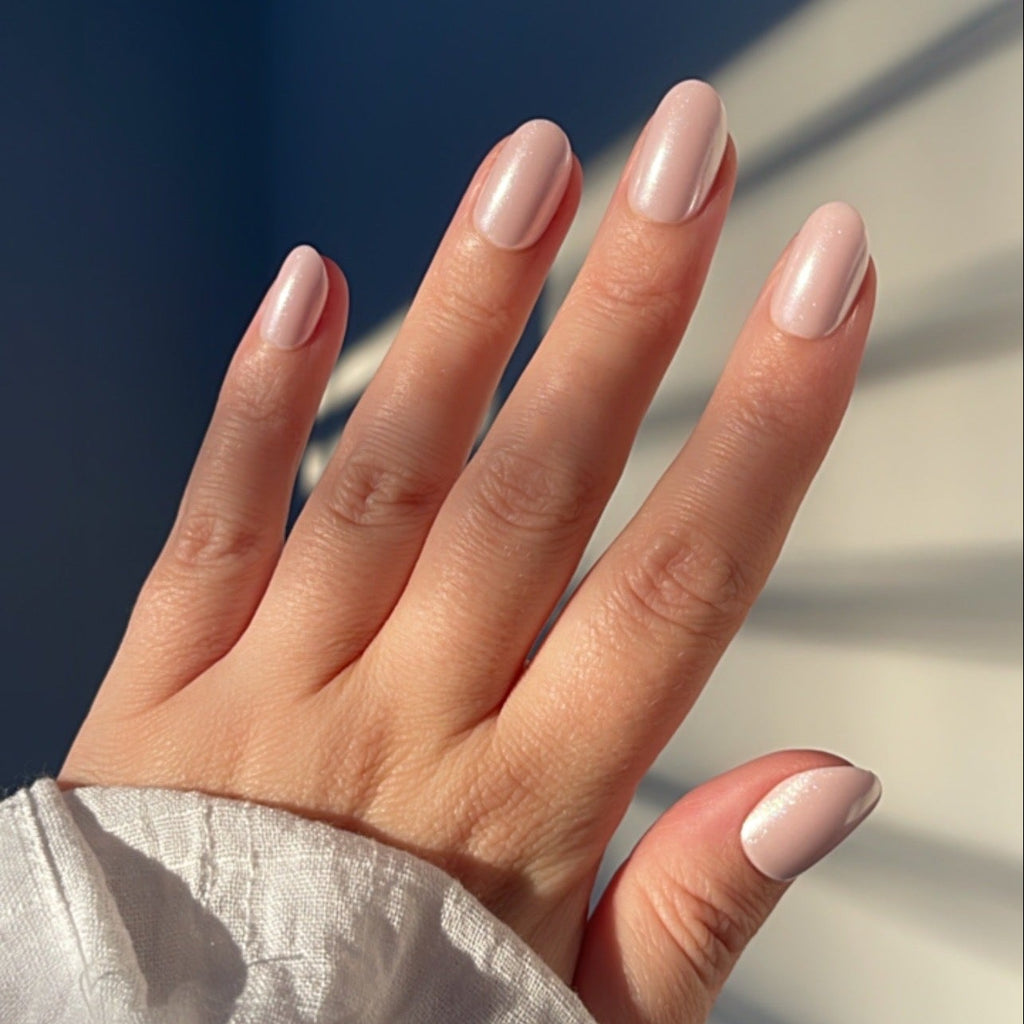 Girl wearing Instant Mani Co. Posy Pink Chrome press on nails 