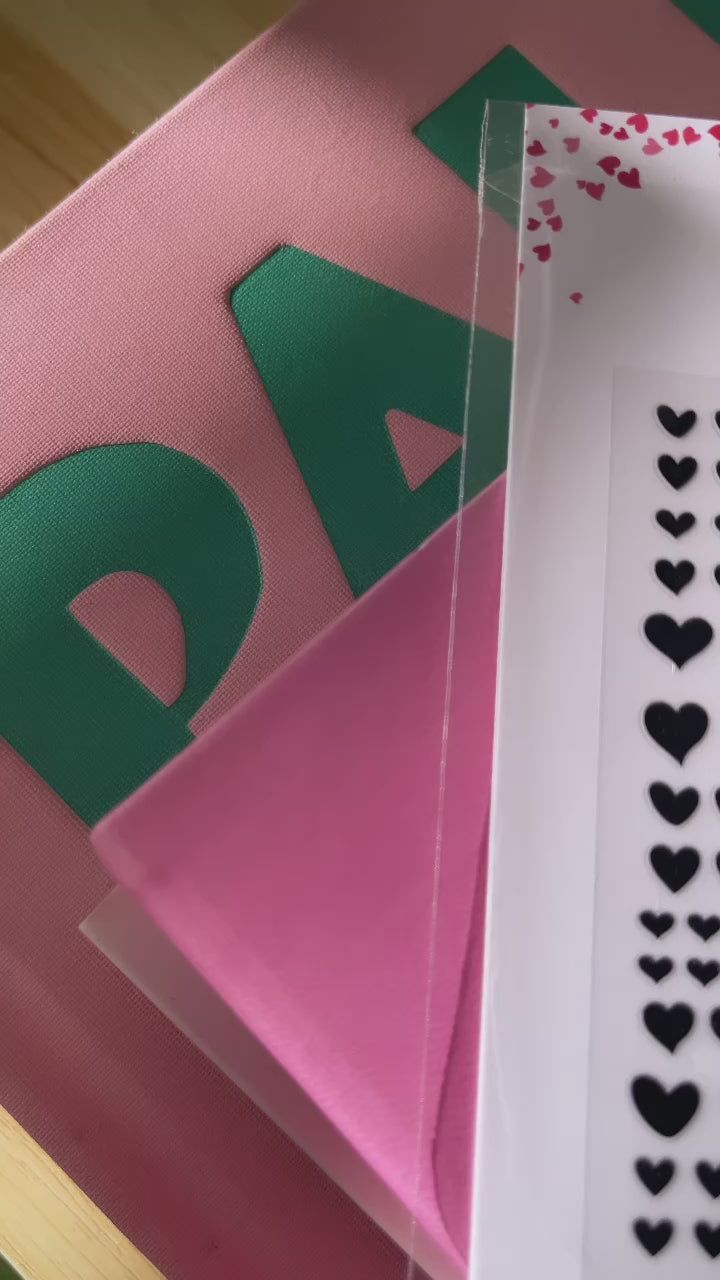 Video of persona applying Instant Mani Co. heart shaped nail stickers